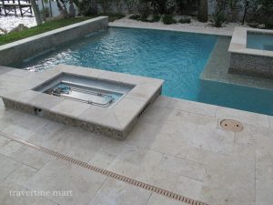 ivory travertine unfilled and tumbled outdoor area pool pavers and coping