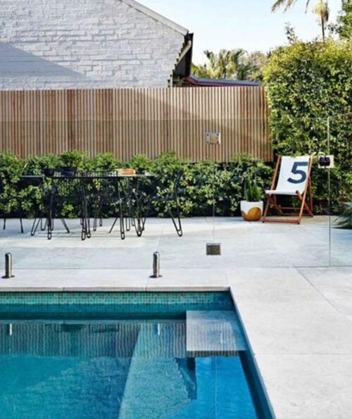 Melbourne Capri limestone pool coping with a tumbled edge