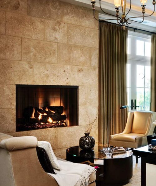Noce Travertine as a wall feature above a fireplace.